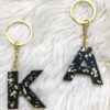 Black Initial Letter Keychain with Gold flakes